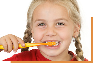 girl brushing her teeth